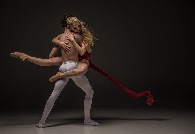 Two people performing ballet