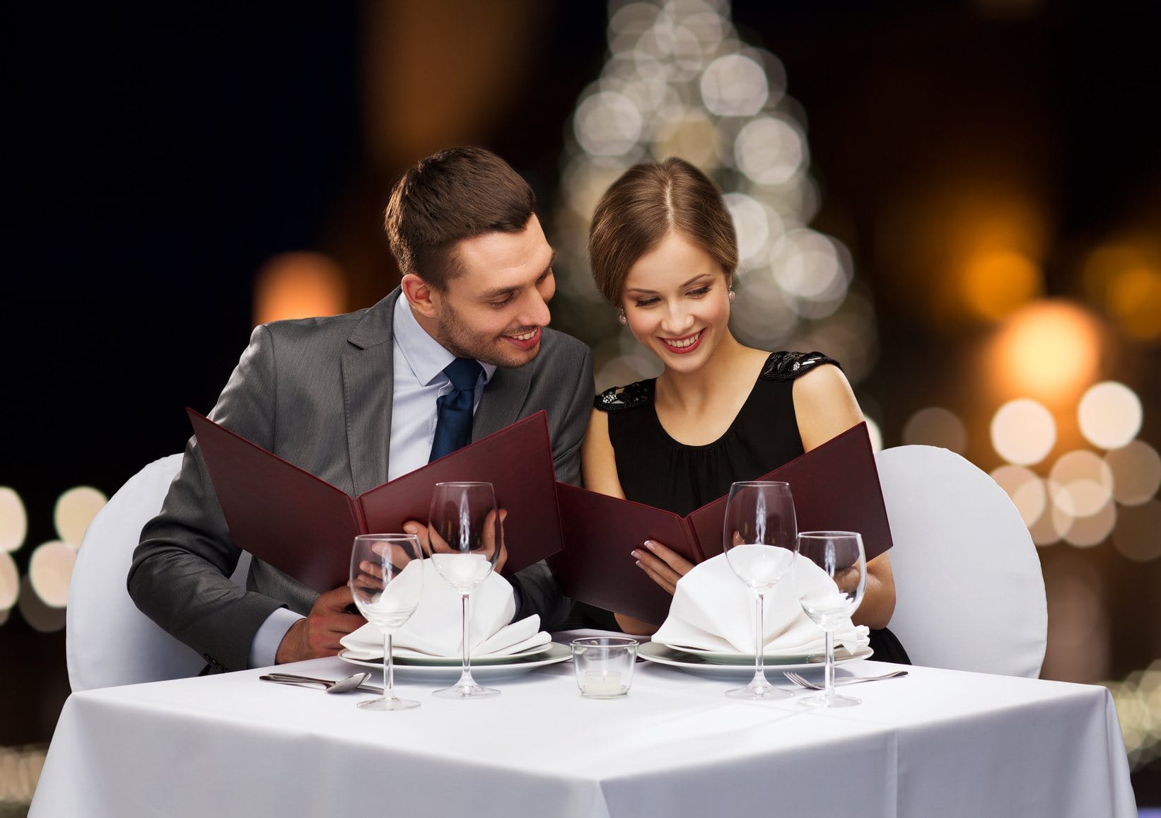 The couple enjoying restaurant