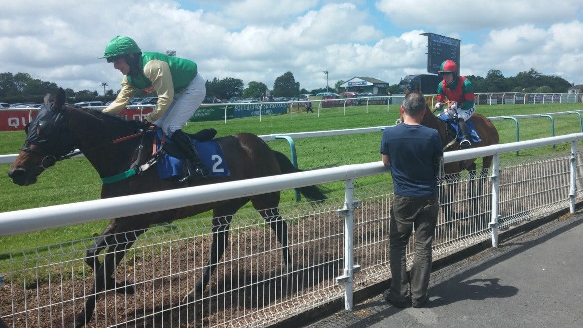 Rider on racing horse